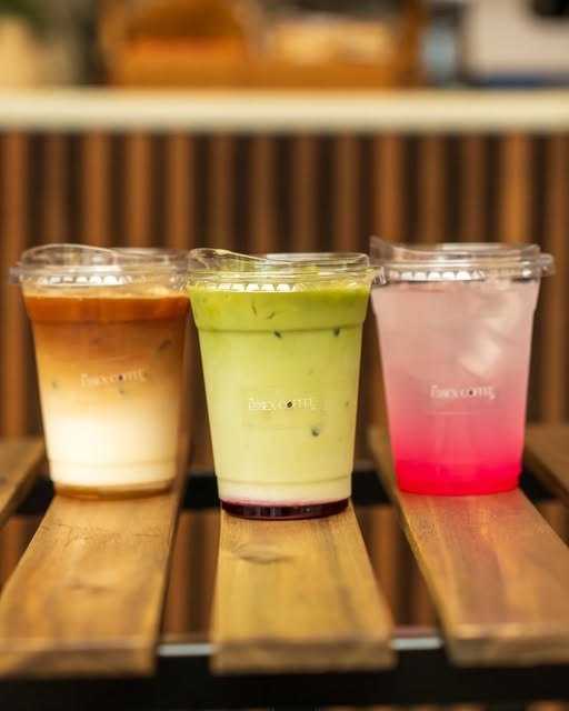 Iced coffee, iced matcha and a fruit soda lined up at Kiosk 10