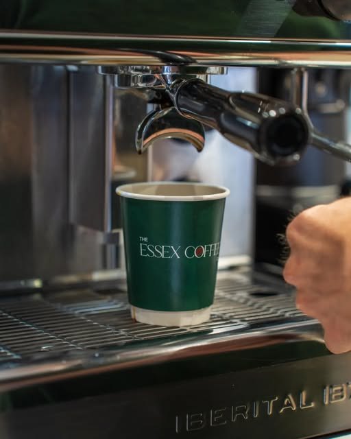 A cup of Essex Coffee Co. coffee being pulled fresh under the espresso machine at Kiosk 10